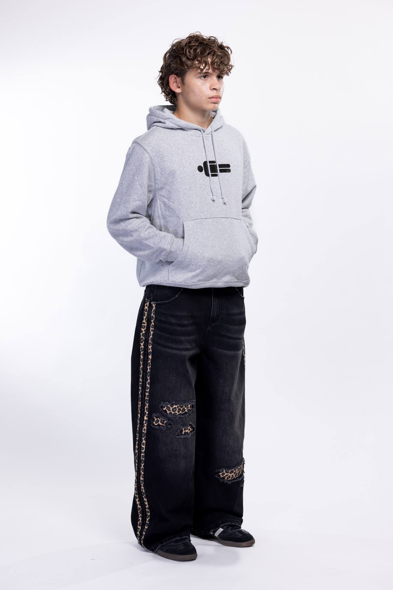 Gray hoodie and black jeans with leopard print on a white background