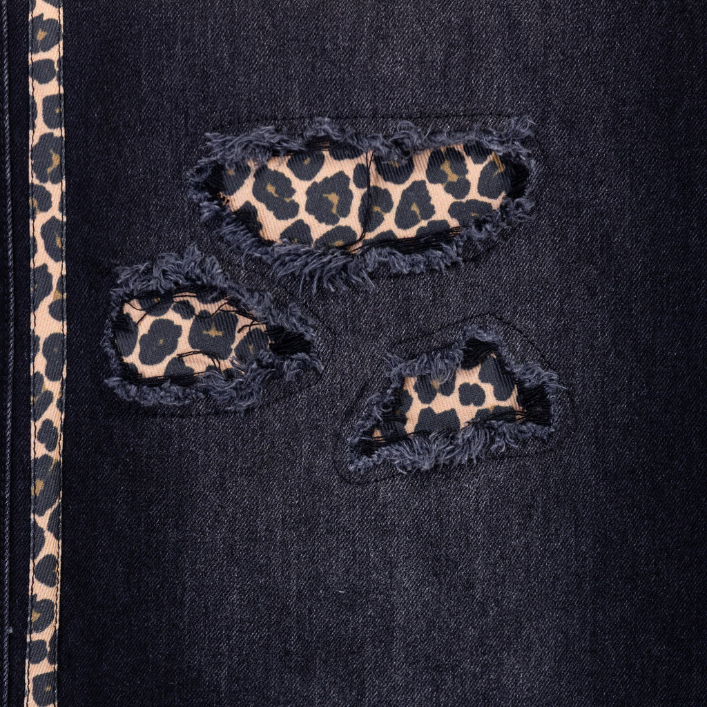 Black jeans with leopard print patches and a strip on the side
