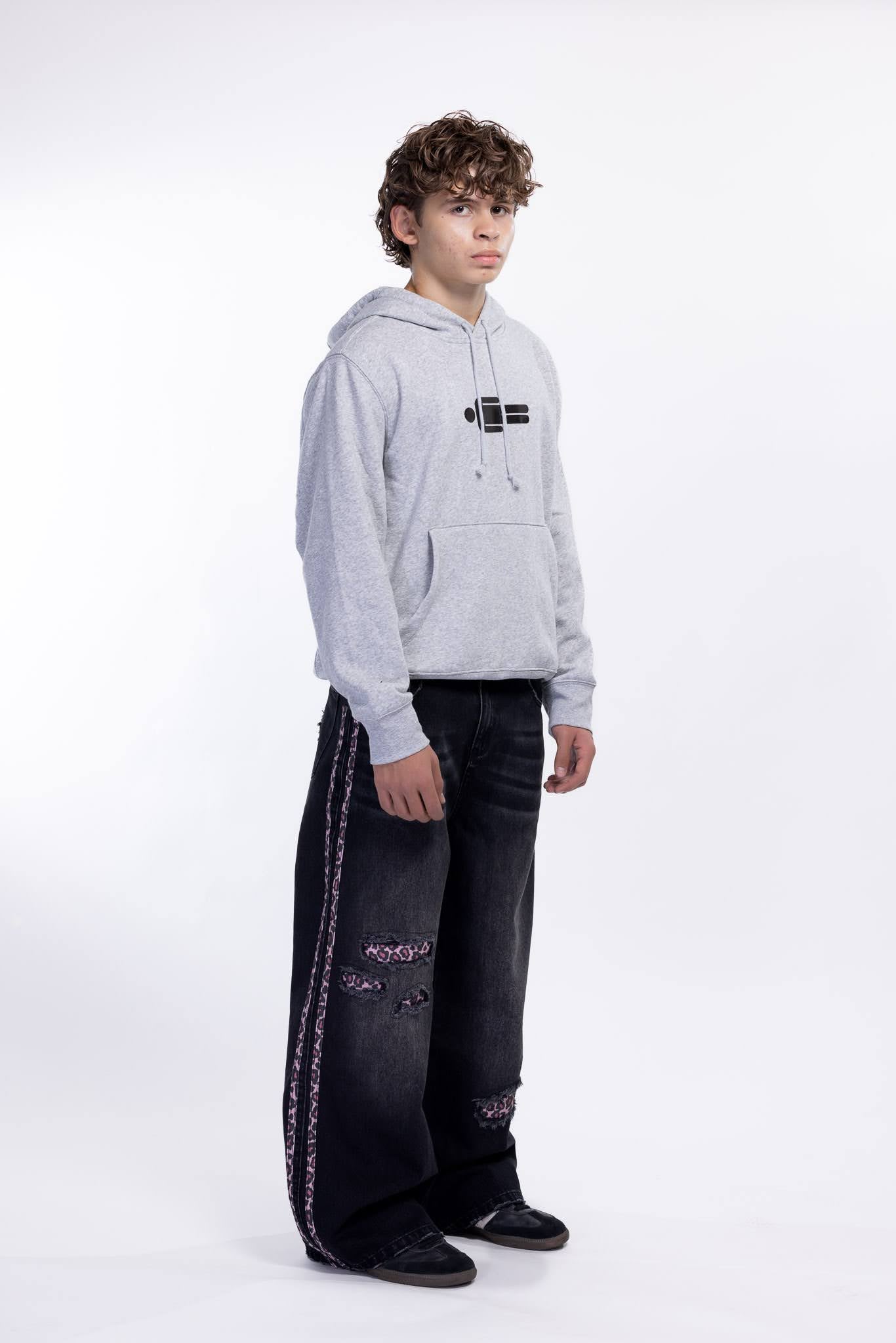 Gray hoodie and black jeans with pink leopard print on a white background