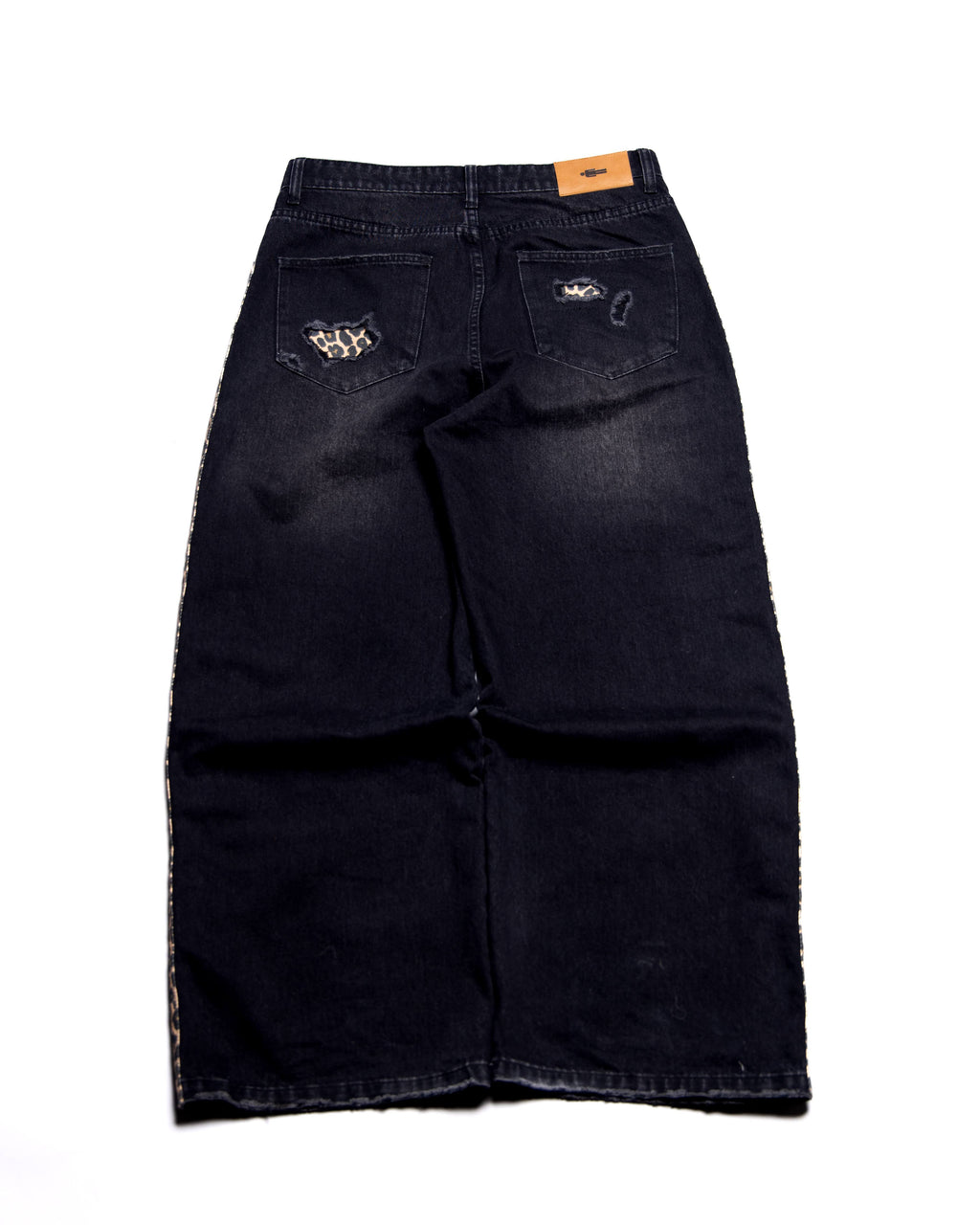 Black denim jeans with brand logo on a white background